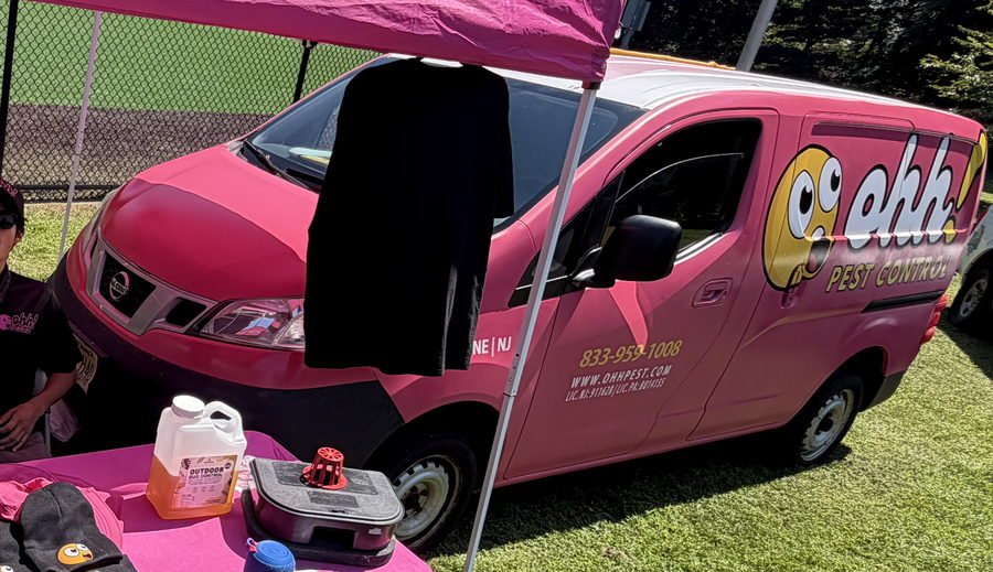 Ohh Pest Control hot pink service van in Northern New Jersey